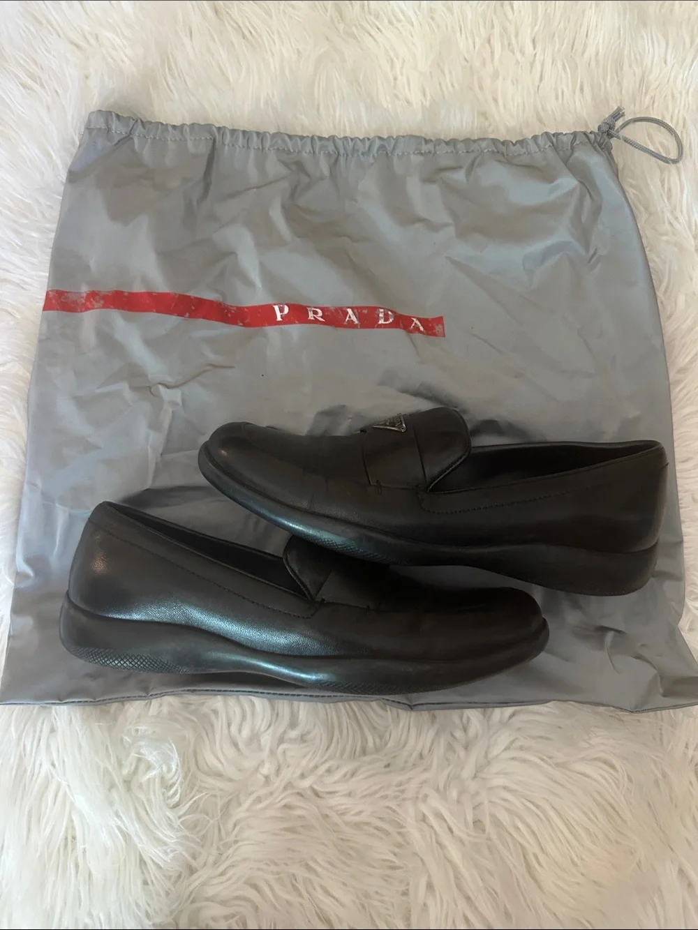 Prada Black Leather Slip-On Loafers with Triangular Logo